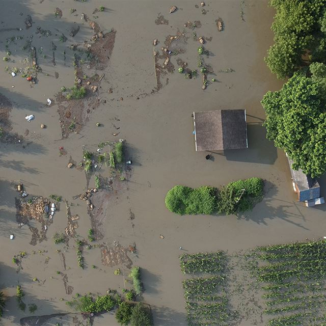 aerial view of a farm in Vermont that is flooded