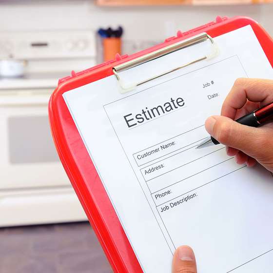 Someone holds an project estimate on a clipboard