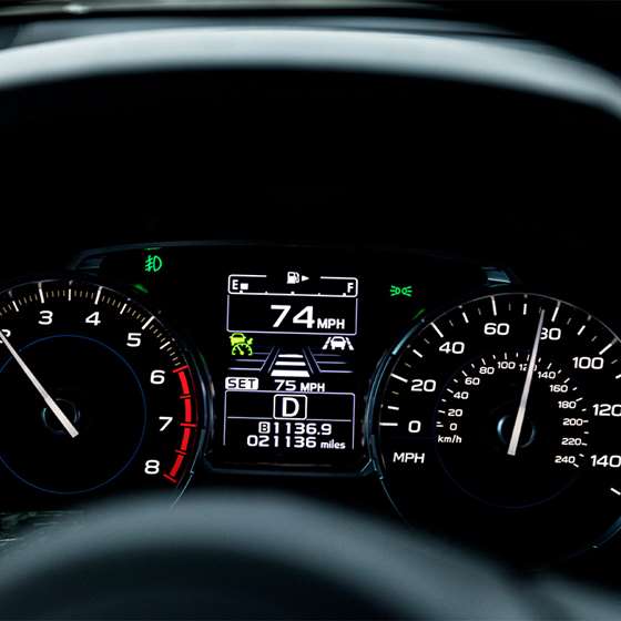 speed gauges on a car dashboard