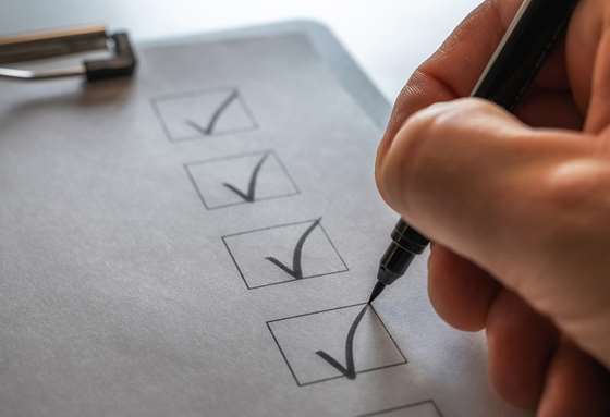 close up photo fo a clipboard and checklist