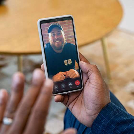 looking at the perspective of someone video calling with an Efficeincy Vermont energy expert on their smart phone