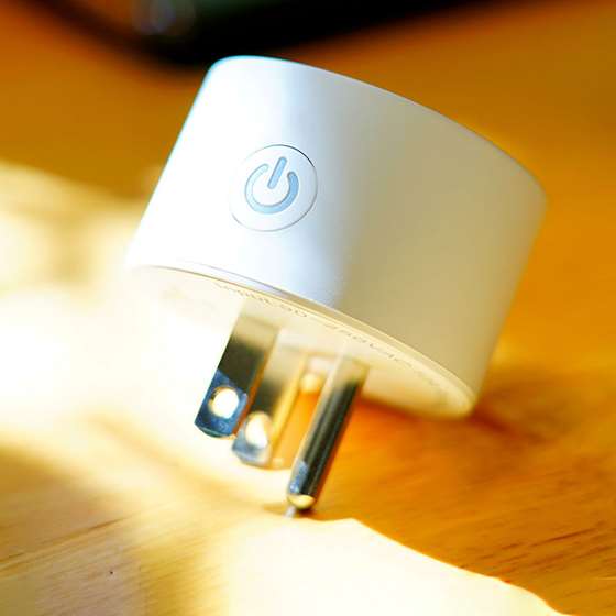 small device what looks like a power strip with a wifi icon 