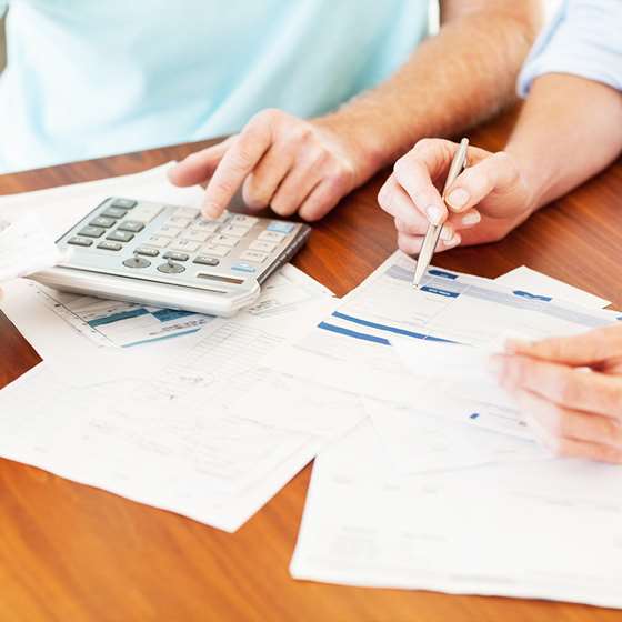 Image of people reviewing energy bills