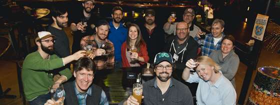 A group raises a glass in a toast