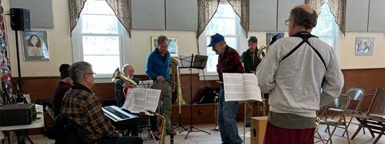 older, rural Vermonters dancing at a grange hall