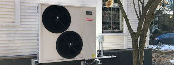 Image of an outdoor heat pump unit.