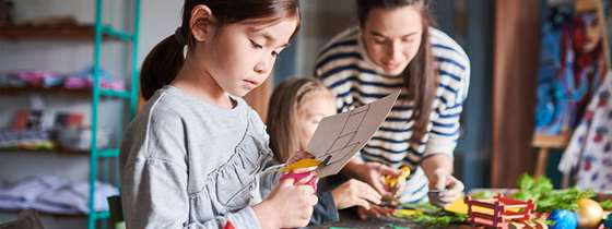 Father and daughter work together on energy activities for kids
