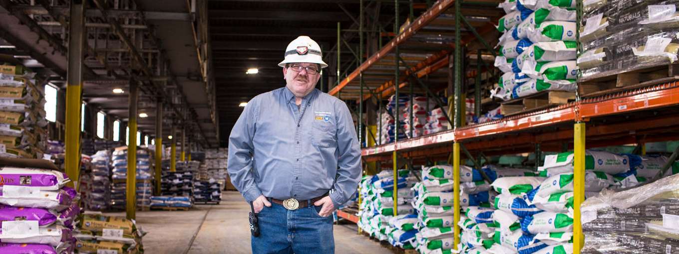 Dan Turcotte stands in the Blue Seal warehouse