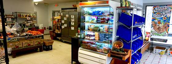 interior of Groundworks store showing produce and refrigerators