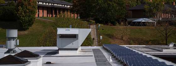 The rooftop units on the MacFarlane Building, next to the solar panels