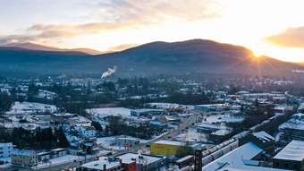 A Vermont town and mountains at sunset