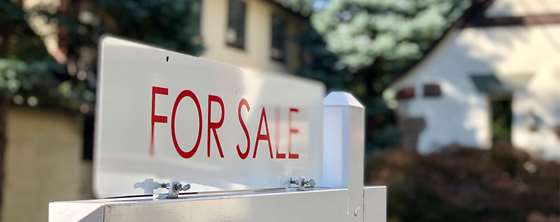 Photo of home for sale sign