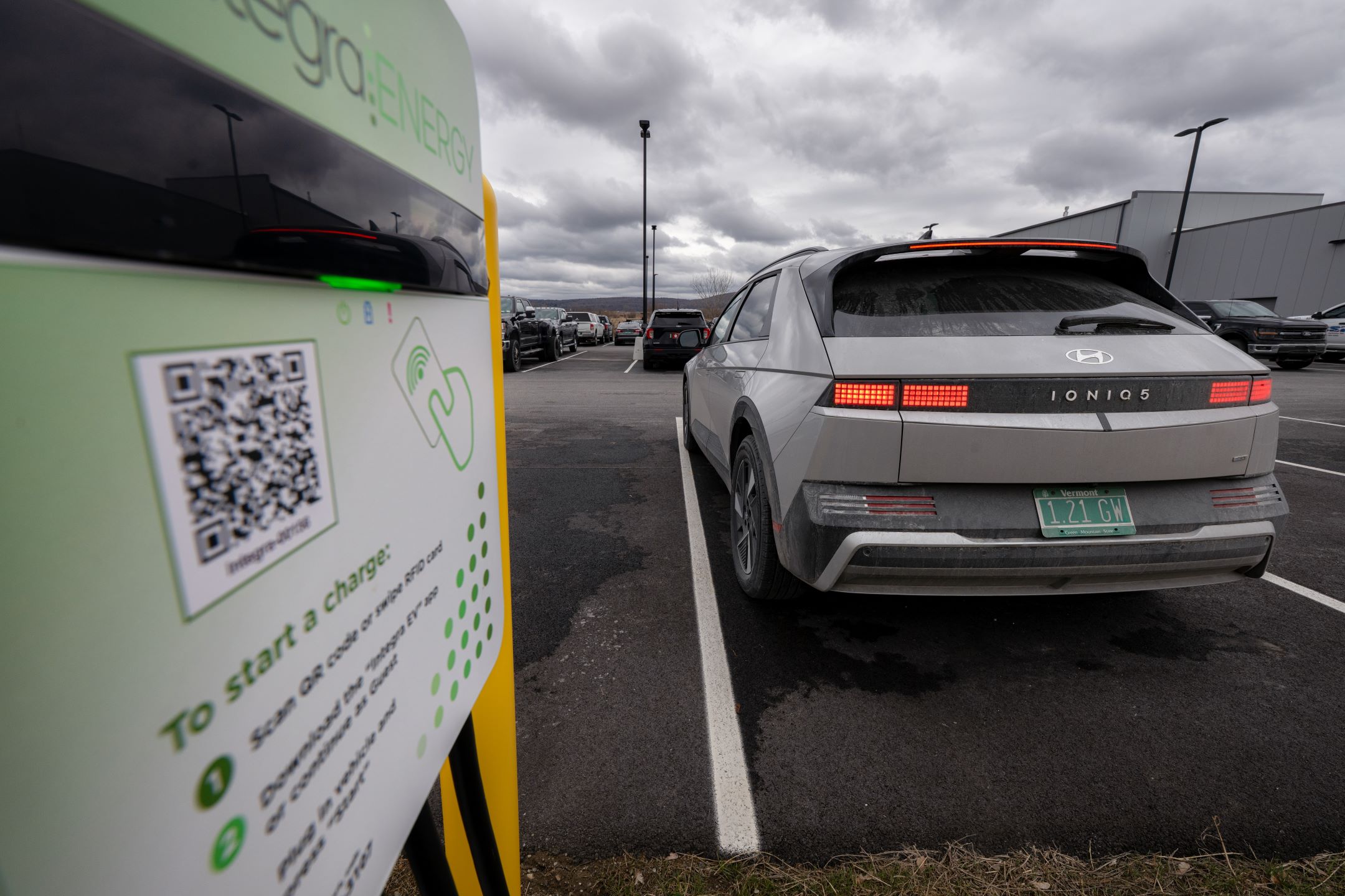 A Hyundai Ioniq 5 electric vehicle prepared to charge at Nucar Automall's new EV charger, installed to support Nucar in selling and servicing EVs.